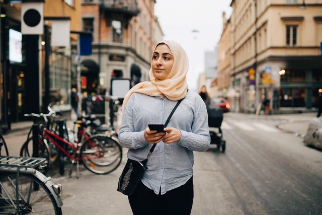 Muslim woman walking in the city